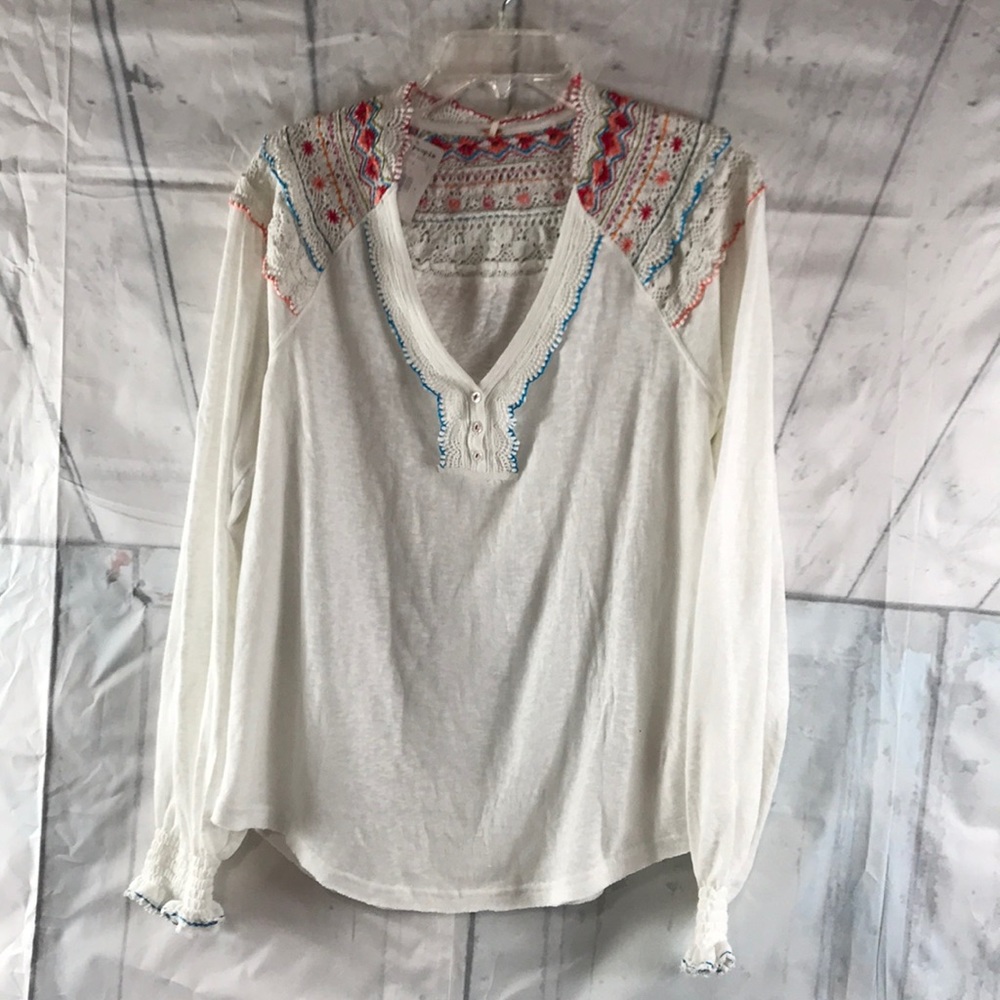 Free people top. Size small. Ivory